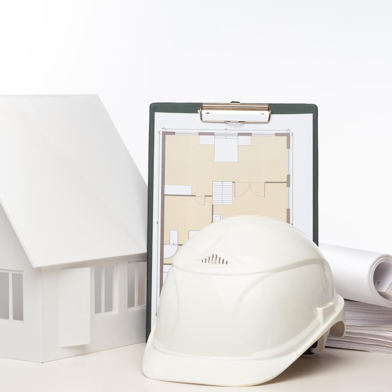 Work,on,the,construction,plan,of,the,future,cottage.,the